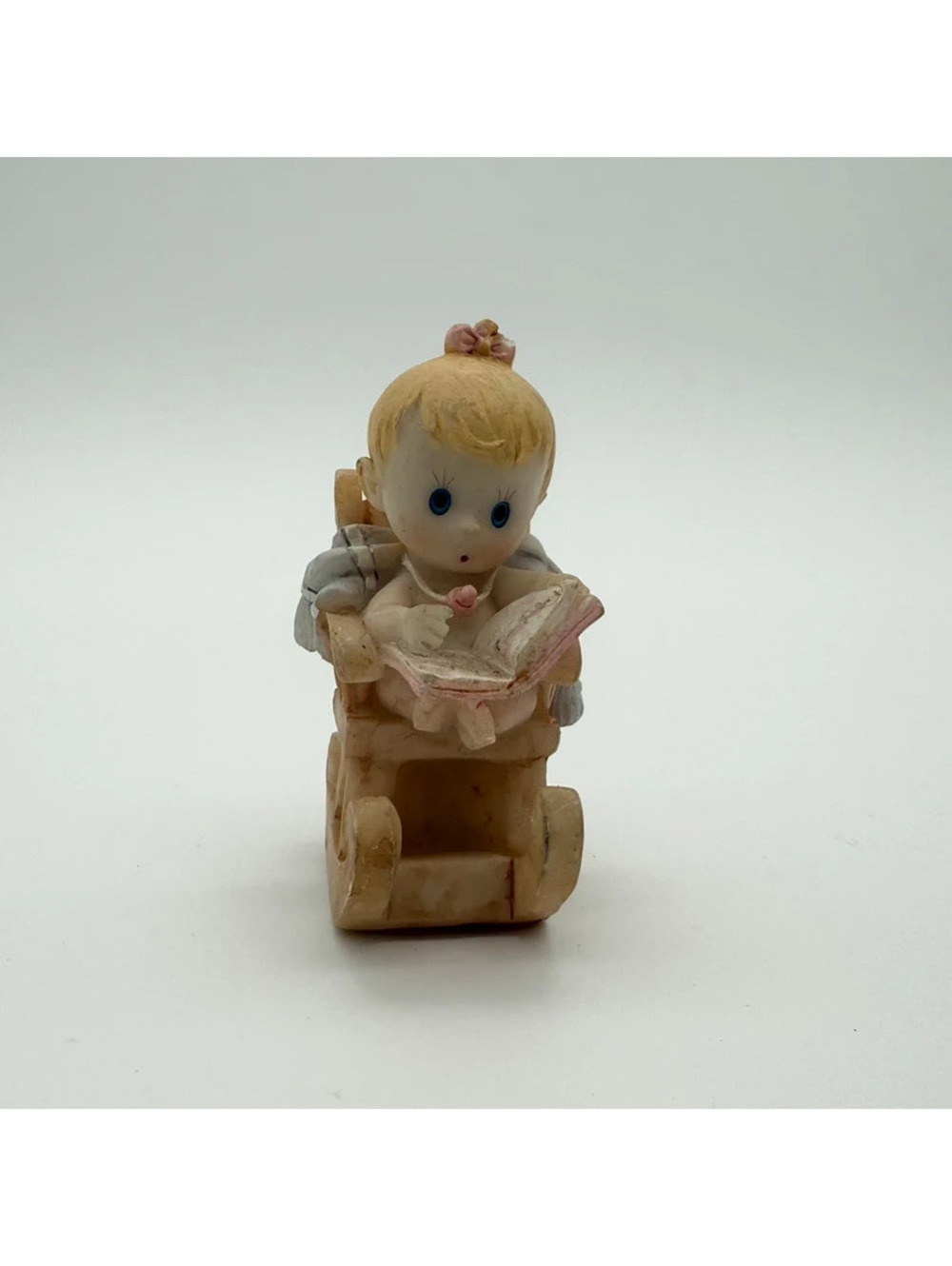 Baby in High Chair Figurine